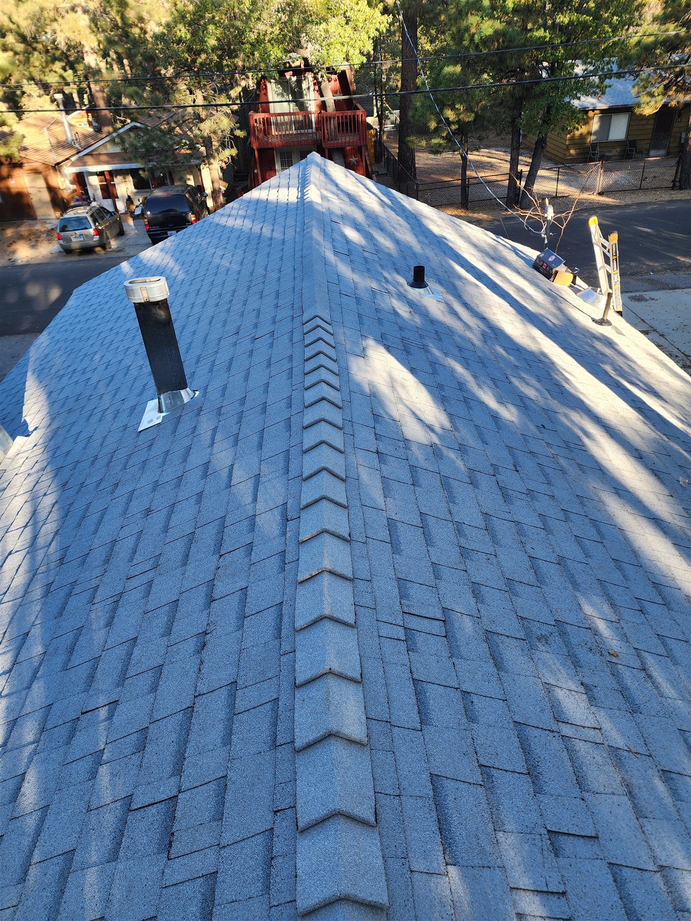 Completed roof replacement with gray shingles